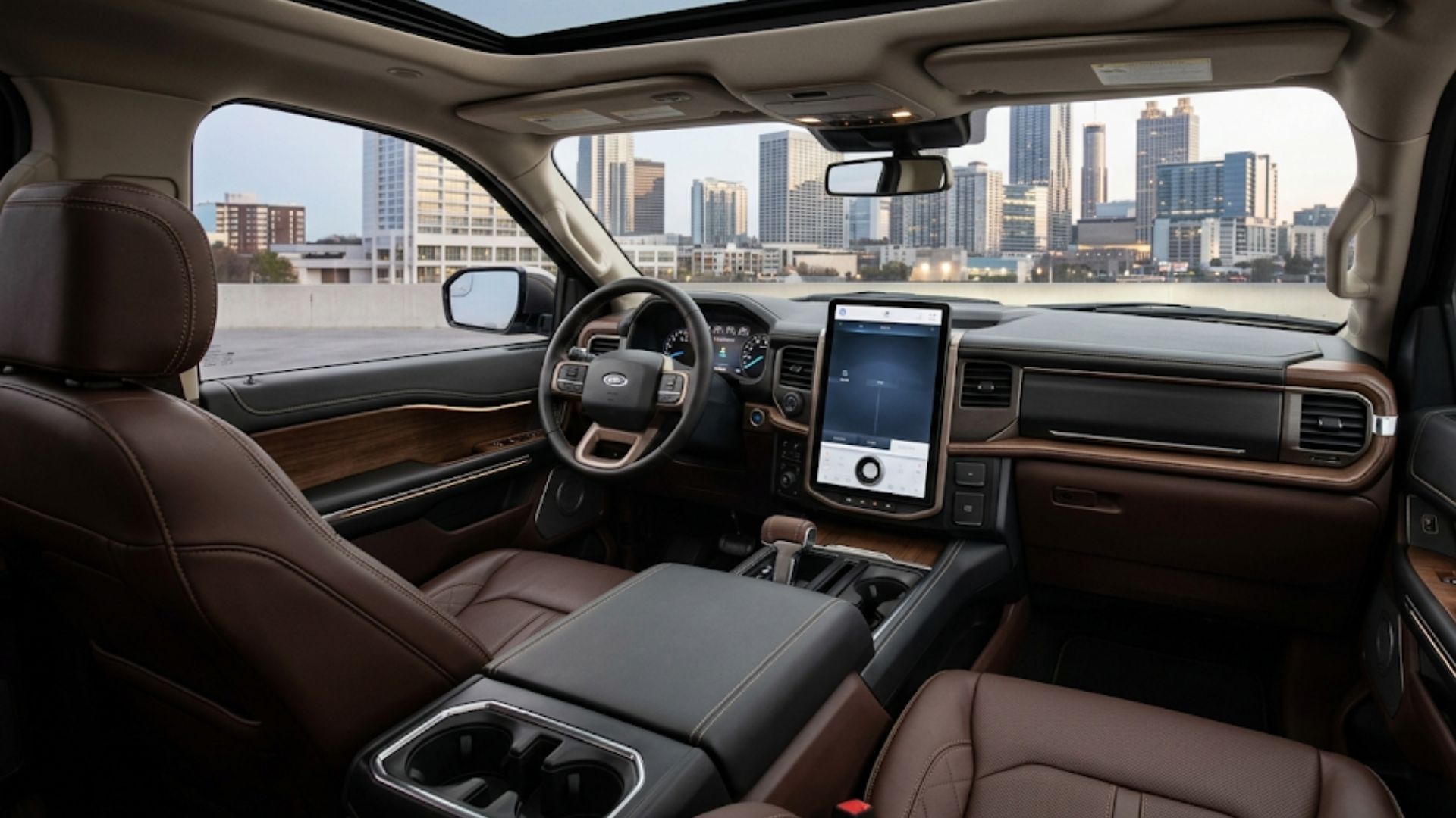 Luxurious car interior with brown leather seats and a large touchscreen display.
